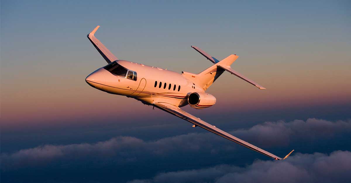 Hawker 850XP in flight at sunset